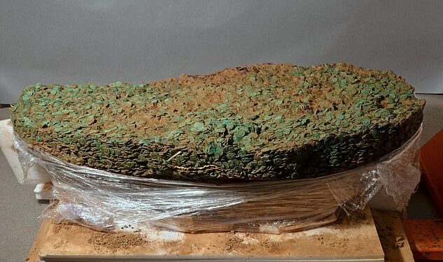 Detectorists unearth record-breaking haul of 69,347 Iron Age coins after a 30-year search