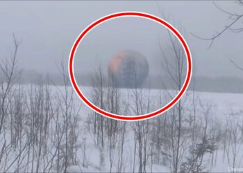 A giant sphere emitting glowing designs has been filmed in Russia—sparking claims of alien technology that could send hidden messages in plain sight.
